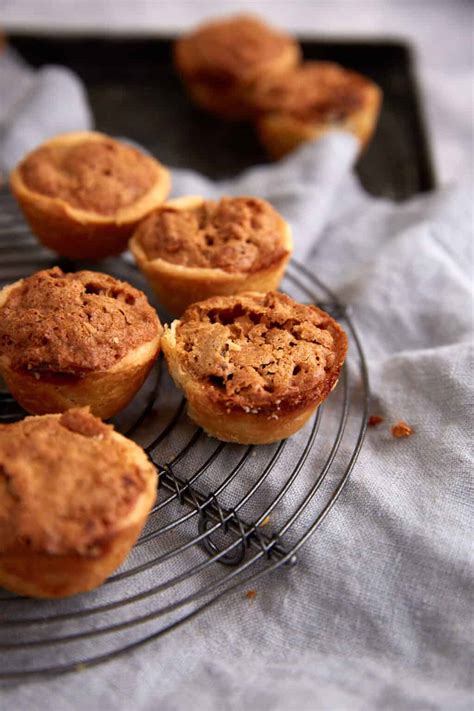 Mini Pecan Pie Tarts with a Cream Cheese Crust - Butter & Baggage