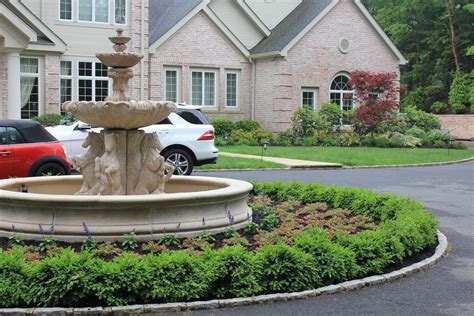 Create Curb Appeal with Fountains, Annuals, and Boxwoods