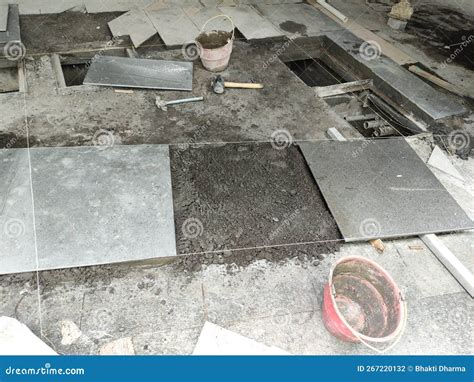 Installation of Granite Tiles on the Floor. Stock Photo - Image of ...