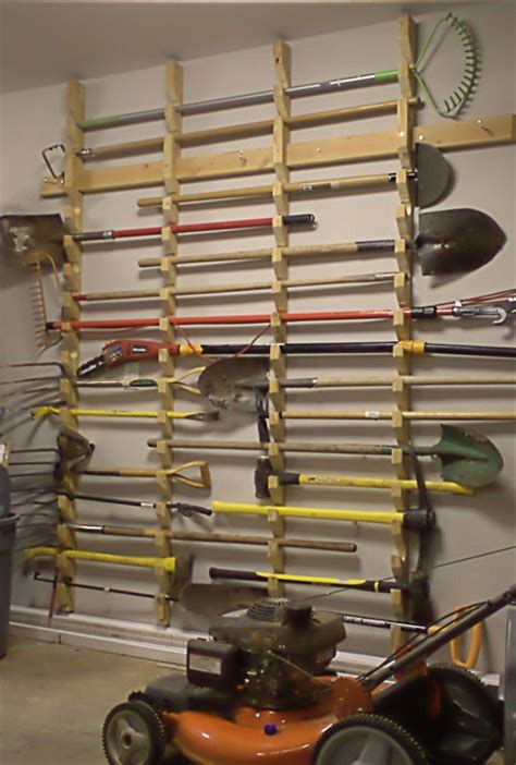 Garden Tool Rack | Garage organization, Garden tool rack, Garage ...