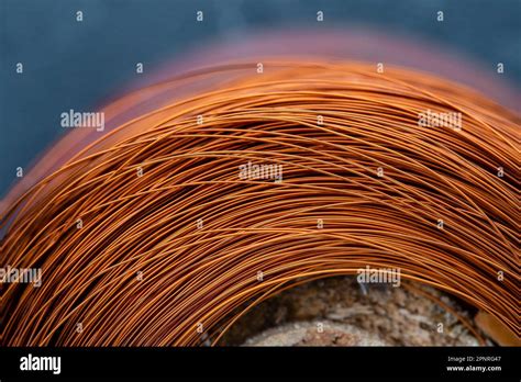 Metal texture of a coil of copper wire, close-up. Coil of thin copper ...