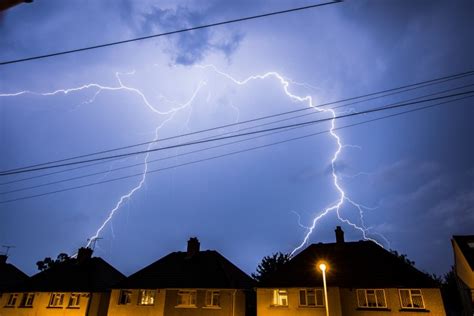 'Sign From God': Shocking Moment Lightning Strikes House During Viewing