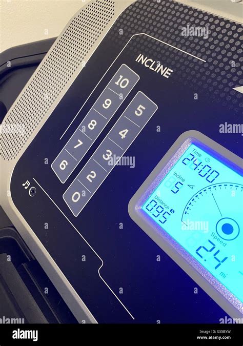 Home treadmill screen with incline and lighted screen Stock Photo - Alamy