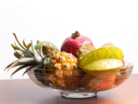 Glass bowl with exotic fruits | Stock image | Colourbox