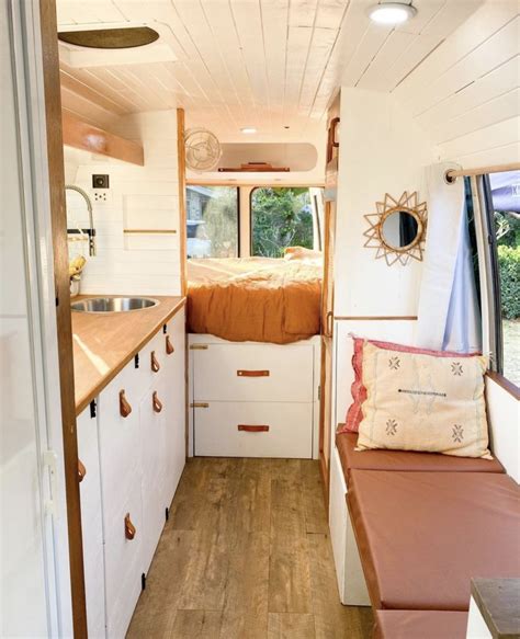 This young couple converted a $15,000 Toyota Coaster into their first home