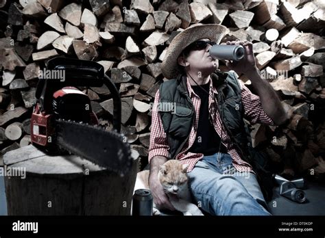 Lumberjack with chainsaw Stock Photo - Alamy