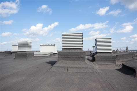 5 Commercial Flat Roof Types For Durability and Lifespan | Cox Roofing ...