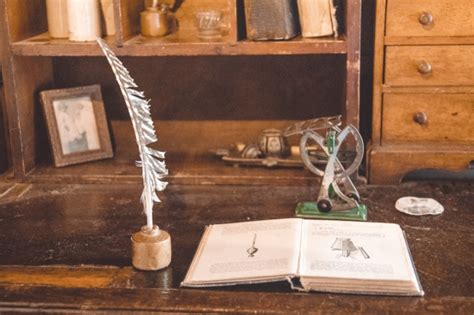 Quill And A Book Free Stock Photo - Public Domain Pictures