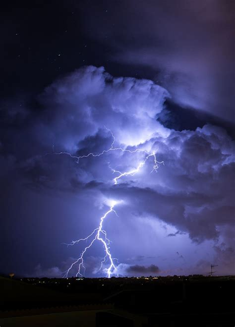 LIGHTNING bolts illuminate the night sky in Sardinia in these dramatic ...