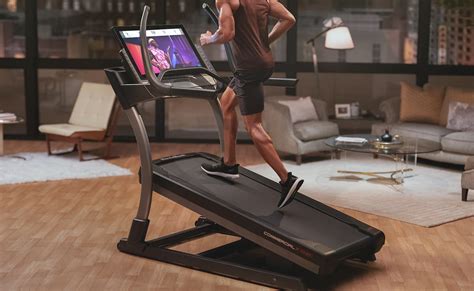 This Smart HD Touchscreen Treadmill Has a Trainer