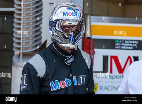 Pit crew in chrome effect helmets at the Le Mans 24hr endurance race ...