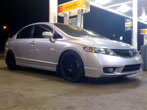 Silver honda civic with black rims