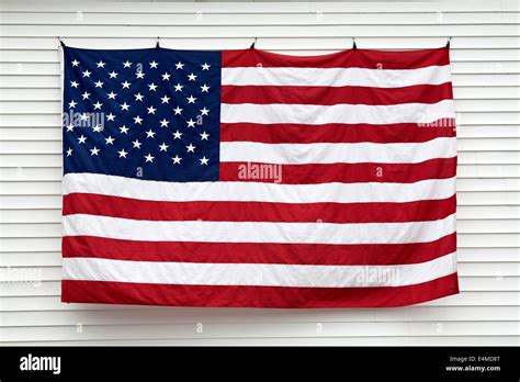 American flag hanging on a a wall Stock Photo - Alamy