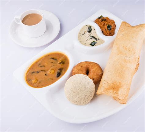 Premium Photo | Group of south indian food dosa, idli or idly, vada ...