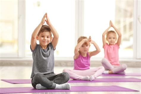 Teaching Yoga To Kids: How To Get Started + Tips - The Studio Director