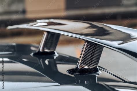 Rear carbon fiber spoiler on a car Stock Photo | Adobe Stock