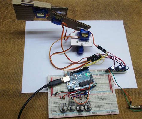 DIY Arduino Robotic Arm Project with Circuit Diagram & Code