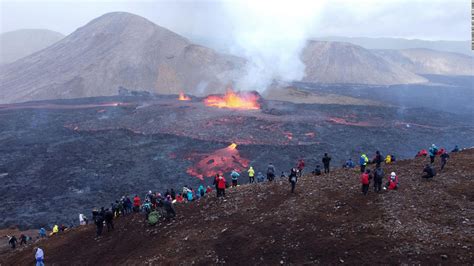 Surprising images: Burning lava from a volcano attracts thousands of ...