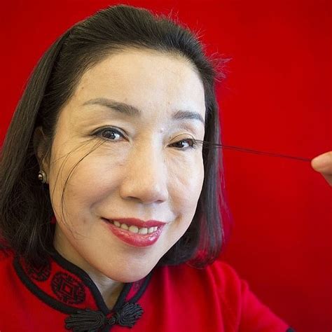 Woman with the world's longest eyelashes breaks her own record with 8 ...