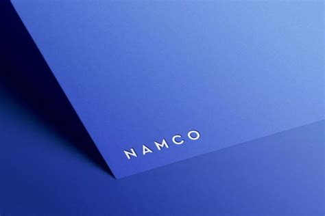 the name namco is written in white on a blue background