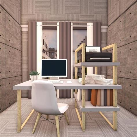 a computer desk sitting in front of a monitor on top of a wooden shelf ...