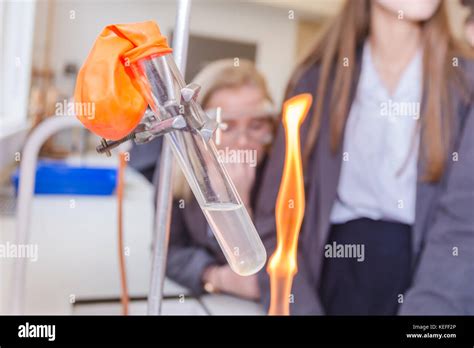 Secondary school UK science lesson with bunsen burner experiment Stock ...