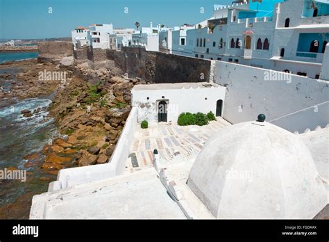 Painted walls in Asilah medina Morocco Stock Photo - Alamy