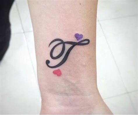 Share more than 73 fancy t letter tattoo best - vova.edu.vn