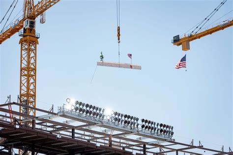 Coliseum renovation reaches halfway point with topping-off ceremony ...