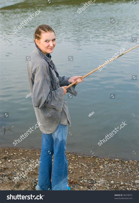 Young Women On The River While Fishing Showing Us Excellent Fishing ...