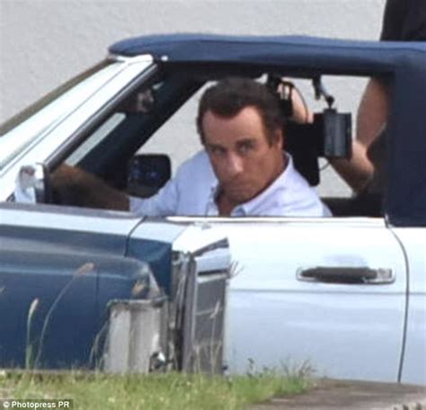 John Travolta's hairpiece stays on during action sequence | Daily Mail ...