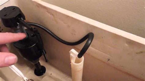 How To Replace Toilet Tank Fill Valve - dismantle the toilet