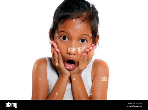 sweet and cute 7 or 8 years old female child shocked and surprised ...