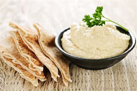 Hummus with pita bread — Stock Photo © elenathewise #4468103