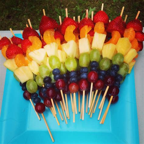 Rainbow fruit skewers I made for my nieces birthday party. She loved ...