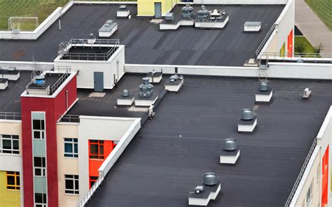 4 Commercial Flat Roof Types That Will Last | AAA Roofing