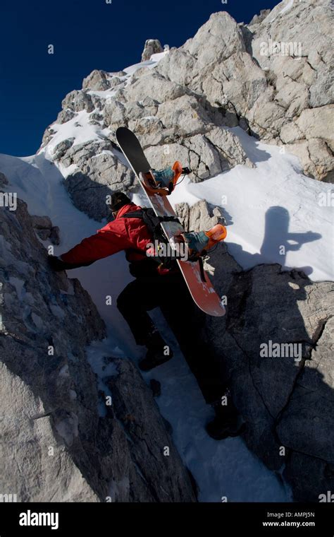 hiking in the snowy mountains Stock Photo - Alamy