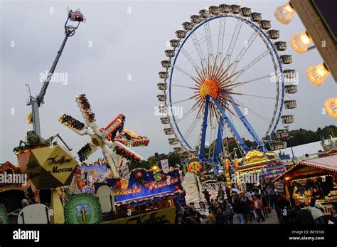 Ferris wheel and fun rides at the Oktoberfest, Munich, Bavaria, Germany ...