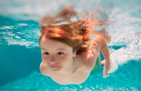 Child Boy Swim Under Water in Sea. Kid Swimming in Pool Underwater ...