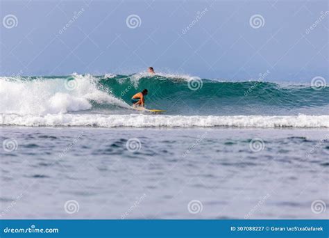 Surfing in Bingin Beach, Uluwatu Bali Island Editorial Photography ...