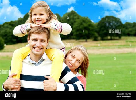 Happy smiling family outdoors Stock Photo - Alamy