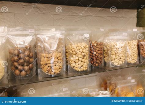 Various Nuts Packaged in the Package for Sale at Market. Close-up of ...