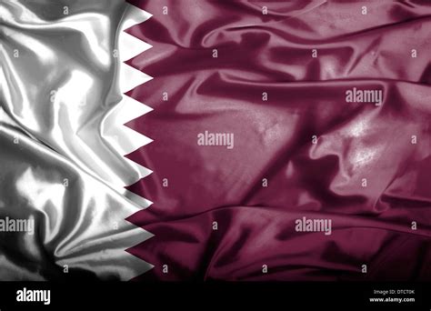 Qatar waving flag Stock Photo - Alamy