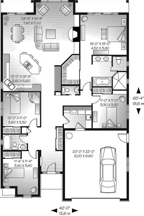 the floor plan for a two story house with an attached garage and living ...