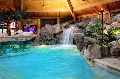 Indoor pools can also feature equally impressive waterfall features ...