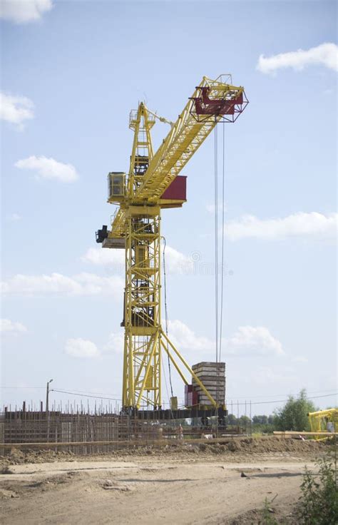 A Crane Works at a Construction Site. Stock Image - Image of skyscraper ...