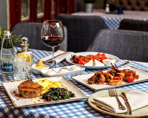 Premium Photo | Assorted food set on a table in the restaurant