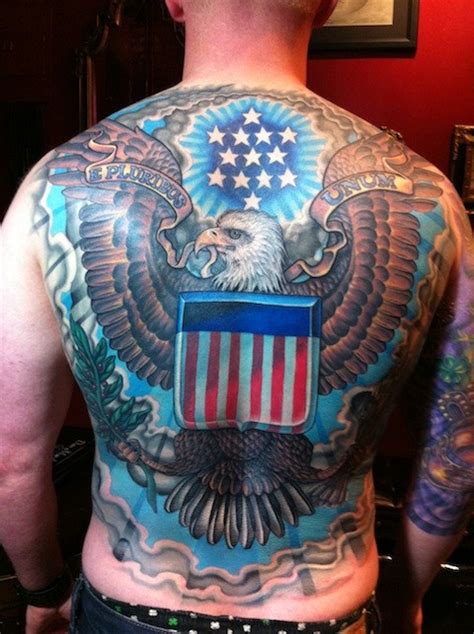 Great eagle and usa flag tattoo on whole back - Tattooimages.biz