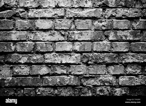 Old brick wall background. Black wallpaper Stock Photo - Alamy