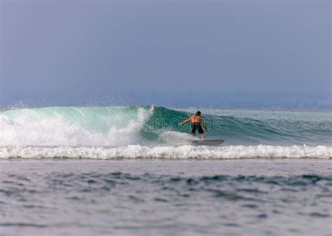 Surfing in Bingin Beach, Uluwatu Bali Island Editorial Photo - Image of ...